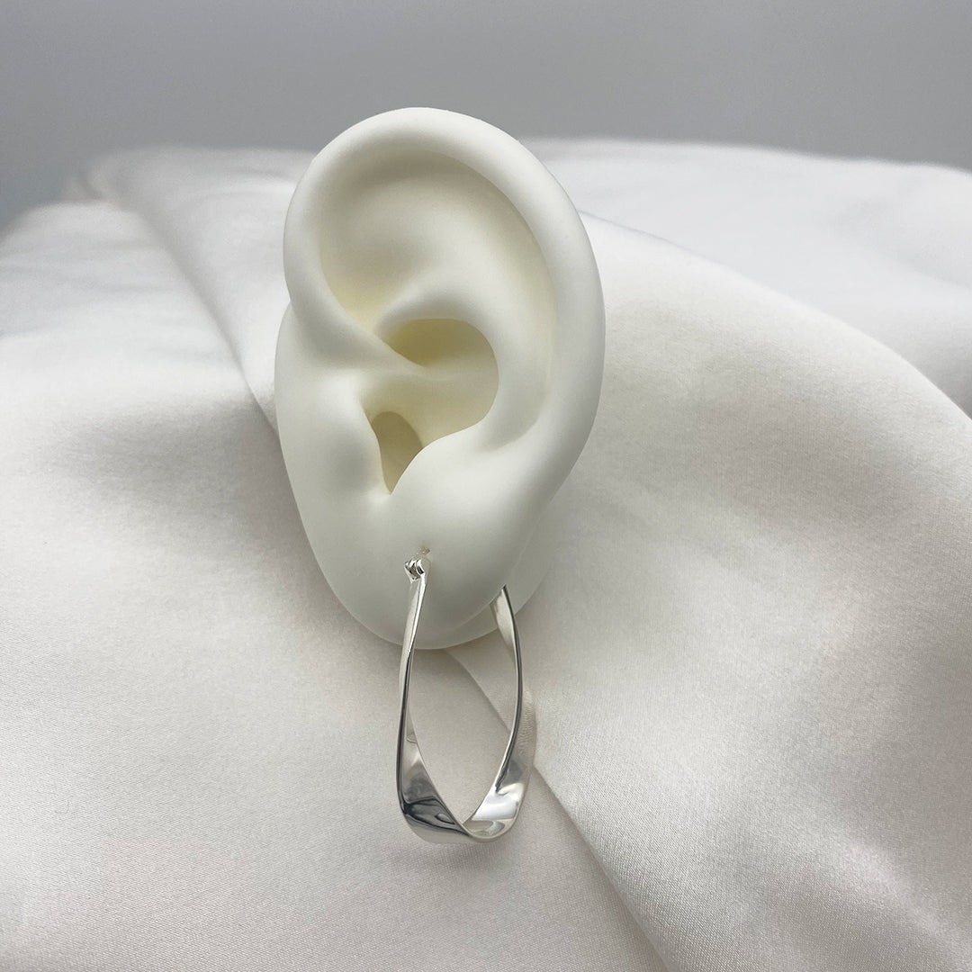 Auskarai TWISTED HOOPS
